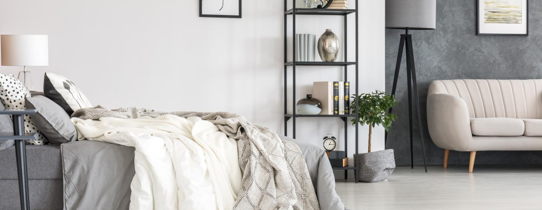 a room with a couch and shelves